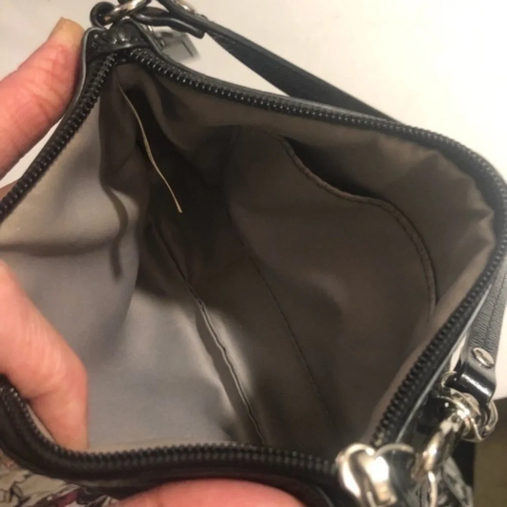 Coach black signature wristlet